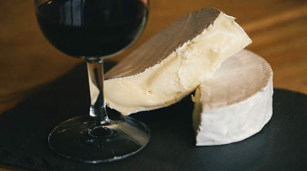 Editorial illustration for Bloomy, Washed, or Natural? How a Cheese's Rind Predicts Its Flavor