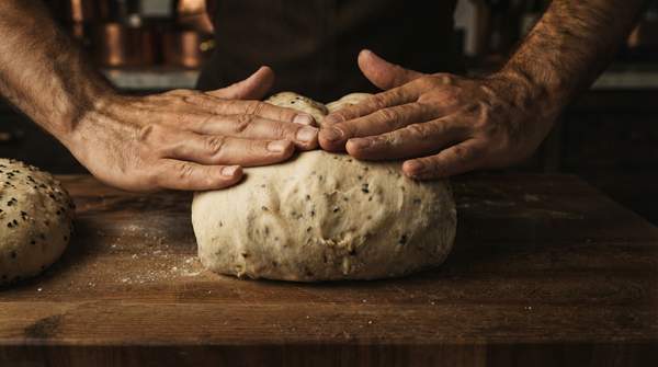Editorial illustration for How Sourdough Hydration Shapes Your Loaf's Crumb and Crust